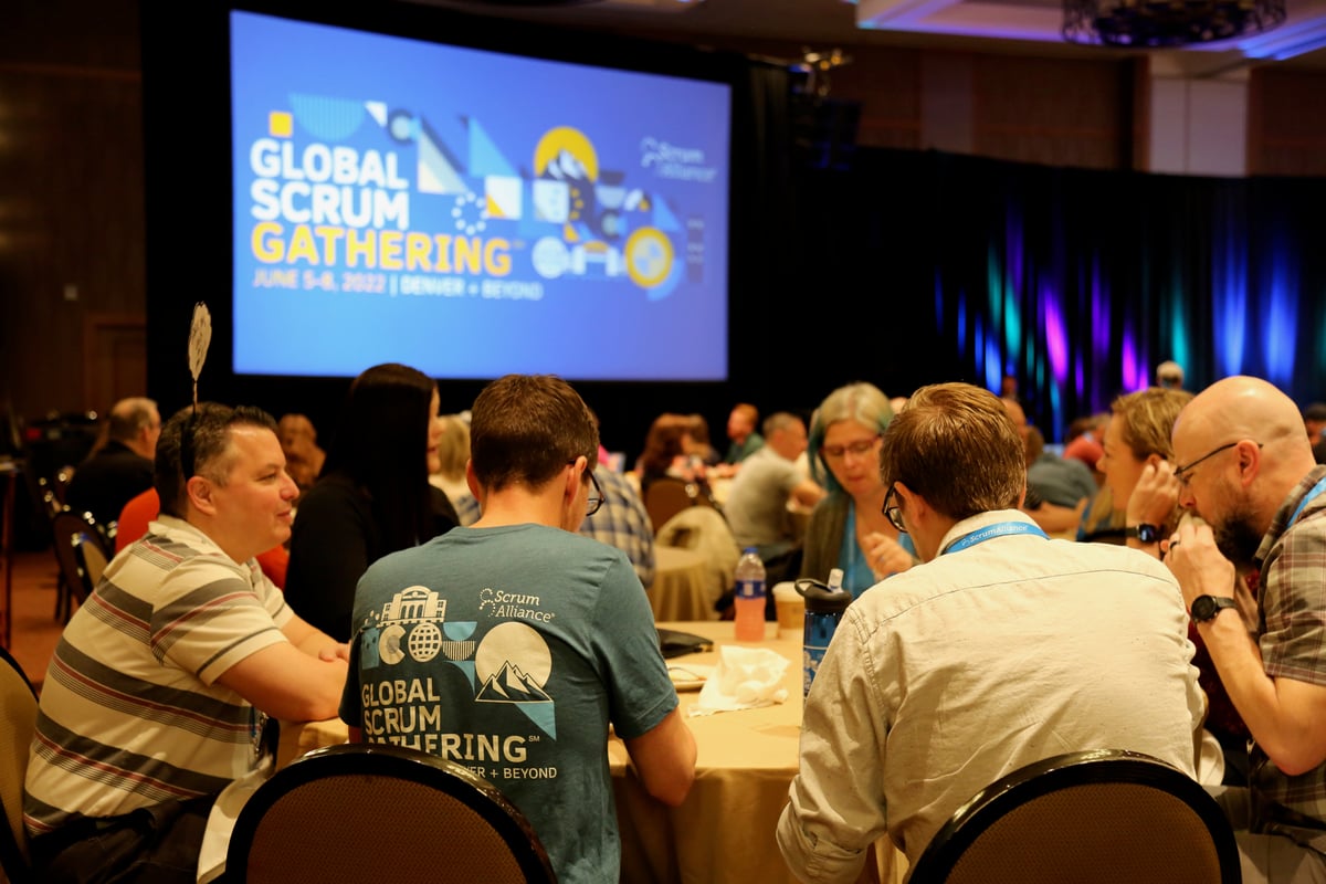 Attendees waiting for the morning keynote to start at Global Scrum Gathering 2022 Denver + Beyond